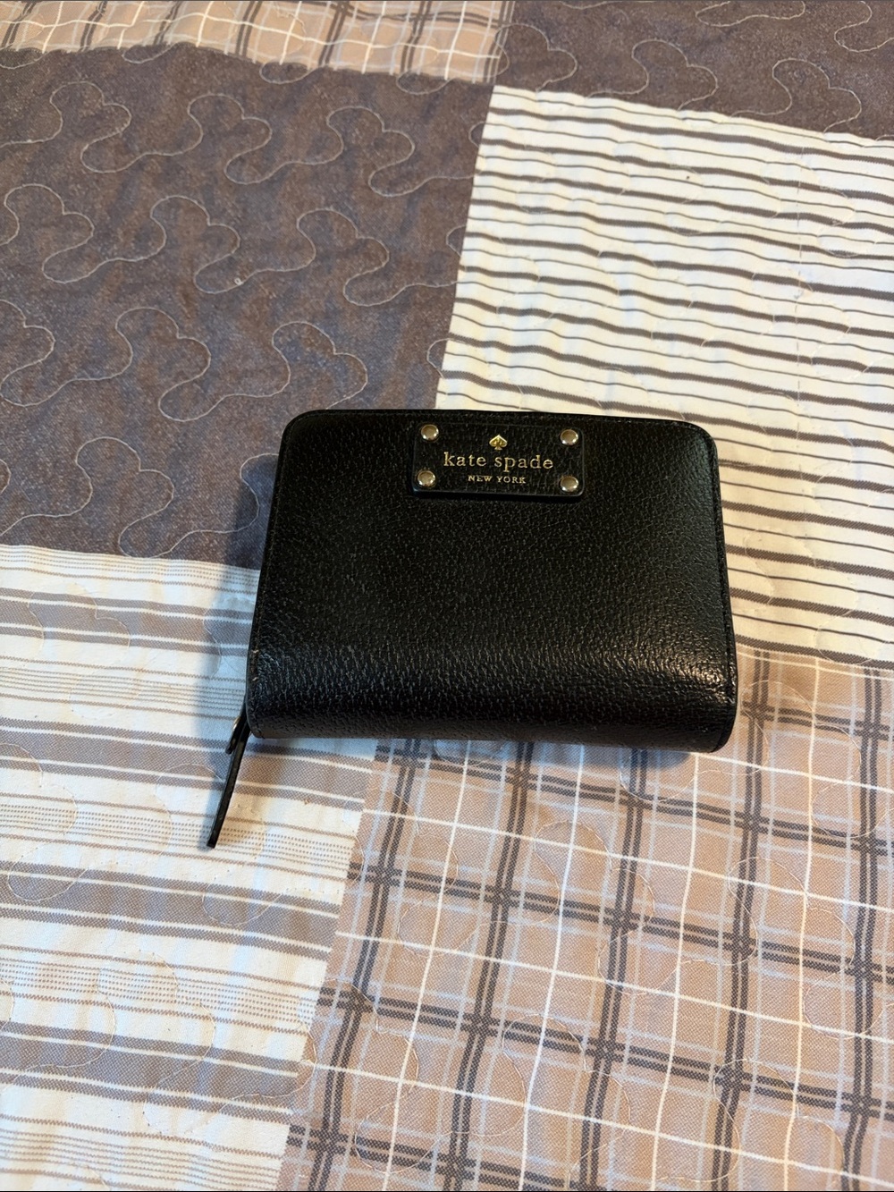 kate spade Black Pebbled Leather Zip-Around Wallet with Gold Plaque